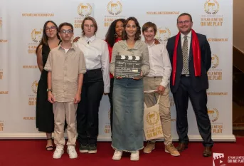 Les jeunes de Saint-François recevant leur prix au grand rex